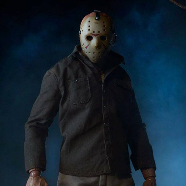 Man wearing a Jason Voorhees Mask front view in dark